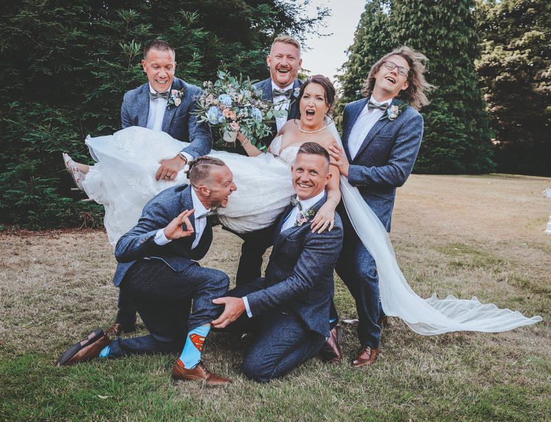 Happy memories being created with this stunning wedding image perfectly lighting Cambridgeshire Essex Bride and groom happy wedding candid wedding 